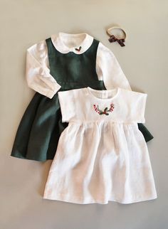 #kids #childrensclothing #childrensclothes Linen Pinafore Dress, Infant Dresses, Thanksgiving Baby Outfits, Styling Jewelry, Fandom Jewelry, Toddler Christmas Dress, Smocked Baby Dresses