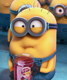 a minion with goggles on holding a pink ice cream in front of other minion characters