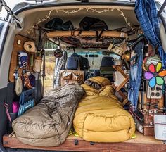 the back of an open van with many items in it