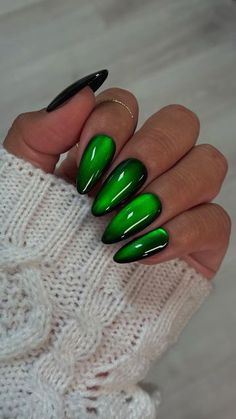 Daily Charme Official on Instagram: "Viral Red Glass Nails, but make them holiday green! 💚🎄✨ These are giving Elphaba from Wicked vibes, do you want to see a pink version for Glinda? 💖Comment “GLASS NAILS” for a direct link to everything you need to create this cat eye look 🔗  Save & share for the ultimate holiday nail inspo! 🎁💅  Using @daily_charme: • Almond Medium B+W Charme Gel Extension Tips • 001 Perfect Black • C09 Mooncat or C92 Figaro • T07 Abs*nthe  • Strong Cat Eye Magnetic Cylinder • Diamond Shine Top Coat   #christmasnails #glassnails #cateyenails #holidaynails #festivenails #greennails #nailartinspo #holidayvibes #nailtutorial #diynails #winternails #greenglassnails #christmas2024 #trendynails #nailartdesigns #nailgoals #bratnails #nailaddict #nailsoftheday #seasonalnail Elphaba Nails Wicked, Green Glass Nails, Green Holiday Nails Christmas, Red Glass Nails, Chrome Green Nails, Green Cat Eye Nails, Holiday Nail Inspo, Strong Cat, Wicked Nails