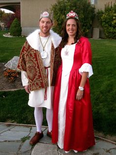 a man and woman dressed up in costumes