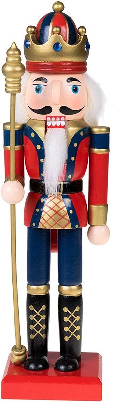 a nutcracker is holding a golden pole