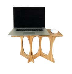 a laptop computer sitting on top of a wooden stand with a mouse and keyboard in front of it