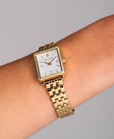 A timeless design taken to new heights! Elevating the classic charm of the Iconic Boyfriend with dazzling definitions and contemporary allure, the Boyfriend Mini Lumous Gold White is an opulent choice that doesn't stray from its vintage inspired roots. The petite 31mm square dial showcases chic numerals on a lavish white, crystal-framed face with intricate crystal details, finished with the classic link chain band. The Boyfriend, White Crystal, Link Chain, Timeless Design, Vintage Inspired, Band, Square, Chain, Crystals