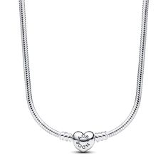 Pandora's classic heart charm meets their iconic snake chain to create the Pandora Moments Heart Clasp Snake Chain Necklace - a tribute to all things Pandora. This snake chain necklace can hold all sizes of the Pandora O Pendant or Heart O Pendant and does not feature threaders (raised charm dividers). Style this sterling silver necklace with your favorite charms for a fully loaded look, or wear it alone as a perfectly simple statement piece. Pandora Style #: 393091C00-45 Pandora Moments Necklace, Pandora O Pendant, Birthday Fit, Pandora Necklace, Wedding Day Jewelry, Snake Chain Necklace, Summer 16, Pandora Style, Dope Jewelry