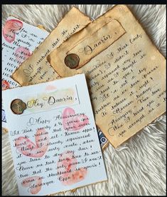 some old letters are laying next to each other