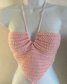 a crocheted halter top on a mannequin