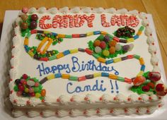 a birthday cake decorated with candies and candy