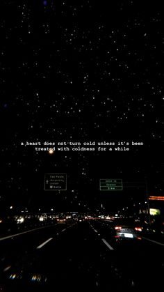 the night sky is filled with lots of stars and street signs that are lit up