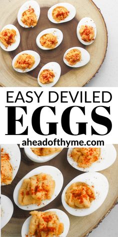 deviled eggs on a wooden platter with the words easy deviled eggs above them