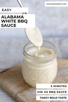 an image of homemade bbq sauce being poured into a jar on a cutting board