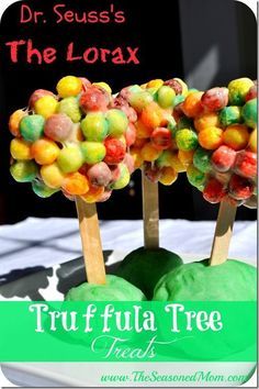 there are two small trees made out of candy candies on top of each other