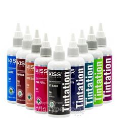 six bottles of ink with white caps on each one and different colors in the same bottle