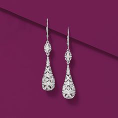 Ross-Simons - .20 ct. t. w. Diamond Teardrop Earrings in Sterling Silver. Our teardrop earrings glimmer with .20 ct. t. w. diamonds in elegant openwork. Hanging length is 1 7/8". Leverback, sterling silver earrings. Diamond birthstones are the perfect gift for April birthdays. Diamond Chandelier Earrings, Diamond Chandelier, Diamond Bows, Diamond Birthstone, Vintage Style Earrings, Earrings Diamond, Cz Jewelry, Hanging Earrings, Dainty Earrings