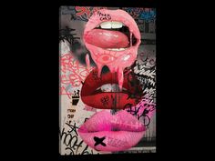 two pink lips with graffiti on the wall behind them