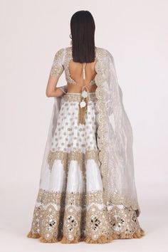 Silver attached cancan lehenga with zari thread, mirror, gota embellishment in floral pattern. Paired with cutwork border embroidered padded blouse and scallop border embroidered dupatta. - Aza Fashions Floral Bridal Lehenga, Mirror Blouse, Abhinav Mishra, Cancan Lehenga, Silver Blouse, Scallop Border, Padded Blouse, Bridal Lehengas, Embroidered Dupatta