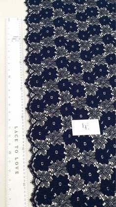 "Navy blue color lace fabric. Both sides scalloped. Width: 145 cm/57.1 inches Item number: LL88331 www.LaceToLove.com Price is set for one meter/yard. You will receive the fabric in one continuous piece if you purchase more than 1 meter/yard. IMPORTANT! Maximum one piece length of this lace is 2.95 meters/yards. If you buy more than 2.95 meters/yards of this lace you will receive it in several pieces. Actual color may vary greatly form the color you see on screen. It depends on your devices scre Blue Lace Trim Wedding Dress, Blue Lace Trim Dress For Wedding, Elegant Lace Fabric With Lace Trim, Elegant Lace Trim Fabric, Stretch Lace Dress With Scalloped Lace, Stretch Lace With Lace Trim For Wedding, Wedding Lace With Stretch, Blue Lace With Lace Trim For Wedding, Blue Lace Patchwork For Wedding