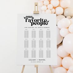 a table plan with balloons and a sign that says our favorite people on the front