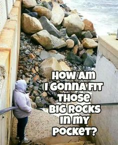 a person standing on some rocks near the ocean with text overlay that reads, how am i going at those big rocks in my pocket?