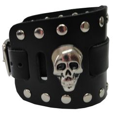 This is a handmade genuine leather watchband with Skull Head Conchos it is a classic style watchband. the cuff has a border of rivets. The has a sturdy buckle for fastening and adjusting the size. Punk Leather Strap Bracelets, Punk Style Silver Leather Wristband, Edgy Leather Bracelet As Gift, Edgy Leather Bracelet Gift, Edgy Leather Bracelet For Gift, Edgy Leather Wristband Gift, Punk Style Leather Strap Bracelets, Adjustable Leather Punk Wristband, Gothic Leather Bracelet With Rivets