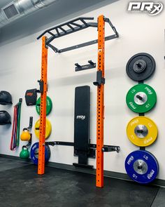 the gym equipment is neatly organized and ready to be used