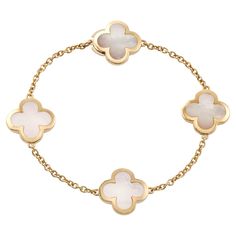 This fabulous Van Cleef & Arpels bracelet from the Pure Alhambra collection is crafted in 18k white gold and features 4 lucky clover motifs beautifully inlaid with mother-of-pearl. Completed with invisible clasp. Made in France circa 2020s. Measurements: 0.62" (16mm) width, 0.27" (7mm) length. Excellent condition. Comes with original pouch and paperwork. Van Cleef Arpels Bracelet, Desired Wardrobe, Gold Vans, Rare Vans, Chalcedony Bracelet, Van Cleef & Arpels, Modern Bracelets, Van Cleef And Arpels, Bracelet Box