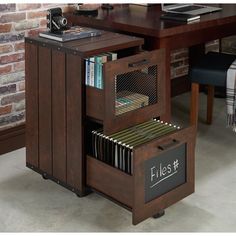 a wooden desk with a chalkboard and file cabinet on it's bottom shelf