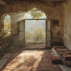 an old room with a large rug on the floor and a doorway leading to another room