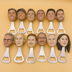 a group of people's heads are shown with scissors in the shape of faces