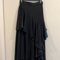 Black Zara Skirt, Light Material And Very Flattering! Never Worn, Tag Still Attached Black Tiered Maxi Skirt For Evening, Zara Tiered Maxi Skirt, Zara Flowy Tiered Maxi Skirt, Zara Evening Midi Skirt, Zara Elegant Ruffled Skirt, Elegant Black Ruffled Maxi Skirt, Zara Black Asymmetrical Skirt, Zara Black Pleated Skirt, Zara Long Maxi Skirt For Party