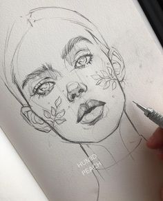 a pencil drawing of a woman's face