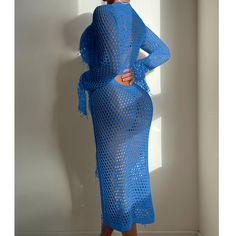 Style: Boho & Vacation Fit: Slim Fabric: Polyester Pattern: Solid Element: Sequin,Cutout Sleeve Length: Long Sleeve Length: Midi (Bottom) Product Type: Dresses Main Composition: Polyester Season: Summer Long Sleeve Hollow Out Beachwear Dress, Fitted Bohemian Blue Cover-up, Vacation Long Sleeve Tassel Cover-up, Blue V-neck Crochet Dress For Vacation, Long Sleeve Fringe Cover-up For Spring, Spring Long Sleeve Fringe Cover-up, Long Sleeve Fringe Beach Cover-up, Long Sleeve Fringe Cover-up For Vacation, Blue Hollow Out Dresses For Summer