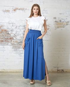 This flowing long skirt with oversized front patch pockets is perfect for achieving a casual and natural look. It can be easily paired with tanks, basic tees, or cropped tops. It's also a versatile day-to-night piece, simply add a denim jacket or leather blazer. Fit - Regular fit Fabric Features - Brushed knit, Stretchy fabric Material Composition - 96% Polyester, 4% Spandex Care Instruction - Machine wash with cold water, Do not bleach, Tumble dry low Please refer to the fact that the actual pr Denim Maxi, Denim Maxi Skirt, Cropped Tops, Leather Blazer, Natural Look, Dark Denim, Basic Tees, Stretchy Fabric, Long Skirt