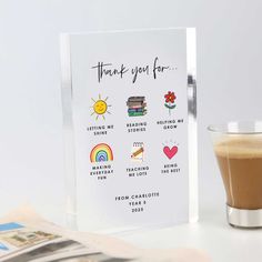 a card with the words thank you for written on it next to a cup of coffee