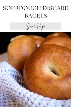 some bagels are sitting in a bowl on a table with the words sourdough disard bags