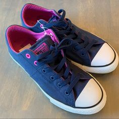 New Without Box. Converse Girls Sneaker In Navy/Purple. Size 5. Cute Blue Sneakers For School, Blue Low-top Canvas Shoes For School, Sporty Purple School Sneakers, Sporty Purple Lace-up Canvas Shoes, Purple High-top Sneakers For School, Cute Purple Round Toe Sneakers, Converse Purple Sports Sneakers, Purple Converse Sneakers For Sports, Cute Purple Sneakers For School