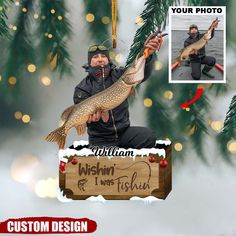 a christmas ornament with a man holding a fish