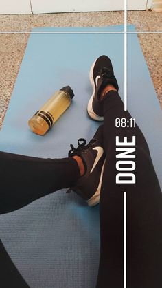 a person is sitting on a yoga mat with a water bottle next to them and the words, do one