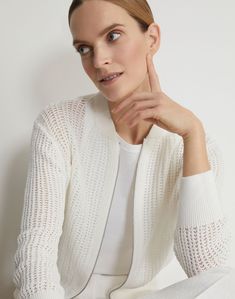 A signature of the L148 knitwear collection, the zip-front cardigan is reimagined for Spring 2024 in a delicate open lace stitch from fine organic cotton rope yarn. Framed by drop shoulders and wide ribbed trims, the relaxed shape fastens with a dual zip closure engineered for effortless layering.Shop all Sweaters White Zipper Closure Cardigan, White Zipper Closure Sweater For Spring, White Zipper Sweater For Spring, Knitwear Collection, Denim Suit, Zip Cardigan, Skirt And Blouse, White Cardigan, Sweater Sale