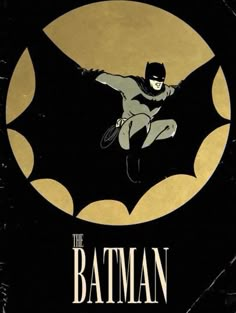 the batman movie poster is shown in black and gold