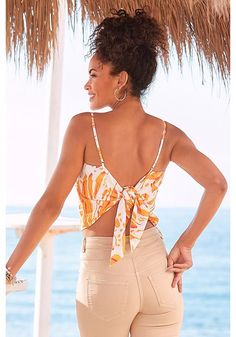 Stay cool and chic this summer with our stylish tie-back top in a chic print. Bra Fitting Guide, Tie Back Top, Swim Brands, Women's Wear, Printed Ties, Swim Bottoms, Shop Swimwear, Stay Cool, Tie Backs