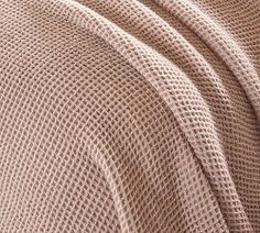 closeup of the textured fabric on a bed