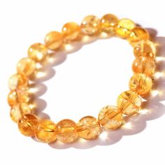 PRICES MAY VARY. Citrine Bracelet：Each bead of this Citrine Bracelet bracelet is natural and unique, simple and fashionable. Wearing it will make you stand out in the crowd and showcase your confident charm. Unique design：Our Citrine Bracelet is made of natural gemstone beads, symbolizing success, wealth, and good luck. Wearing it will make life better and better. Comfy size：Our Citrine Bracelet is handmade and made of hypoallergenic natural yellow crystal gemstone material. It has 8mm beads, is Citrine Bracelet, 8mm Beads, Chakra Jewelry, Citrine Crystal, Natural Citrine, Beaded Stretch Bracelet, Crystal Bracelet, Bracelet For Women, Gemstone Bracelets