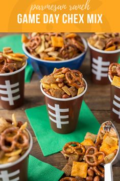 several cups filled with cereal and pretzels on top of green napkins