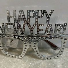 New With Tags The New Year Glasses Are Attractive Among Children And Adults. Funny And Festival Text Design, Create A Festive Atmosphere In New Year Day. You Can Wear The Glasses For Various Occasions Such As Party, Costume Party, Celebration, New Year Party, Which Will More Highlights To You. Features -Color: Silver -Material:Plastic -Size:14.50x14.00x10.00cm/5.70x5.50x3.93in New Year Glasses, Louis Vuitton Glasses, New Year Day, Smith Sunglasses, Fashion Reading Glasses, Chanel Glasses, Gucci Eyeglasses, Gucci Glasses, Oval Eyeglasses