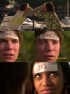 two people with paper taped to their foreheads and one has the words yes written on it