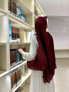 Burgundy red woven tote bag, hijab modest outfit, library