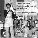 a woman standing in front of an assortment of kitchen appliances with the caption, what is the oldest changed chef product you currently own?