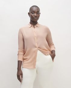 A more relaxed take on the classic button-down—with a silky smooth feel. Polished and easy, the Clean Silk Relaxed Shirt has a traditional point collar and a round hem that looks just as good worn loose as it does tucked in. Plus, it’s made of our eco-conscious Clean Silk, for more beauty and less waste. Elegant Solid Shirt With Shirttail Hem, Classic Shirt With Button Closure And Straight Hem, Elegant Blouse With Button Cuffs For Layering, Elegant Collared Blouse For Layering, Blouse With Button Closure And Shirttail Hem, Elegant Blouse With Shirttail Hem For Layering, Classic Blouse With Button Cuffs For Layering, Layering Button-up Blouse With Button Cuffs, Classic Blouse With Shirttail Hem For Spring