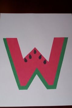 the letter w is made out of watermelon paper